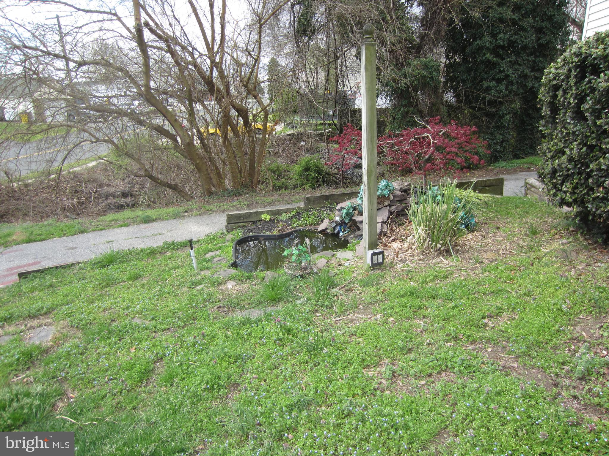 119 Bar Harbor Road Pasadena, MD 21122 - Photo 25 of 29 fish pond in front