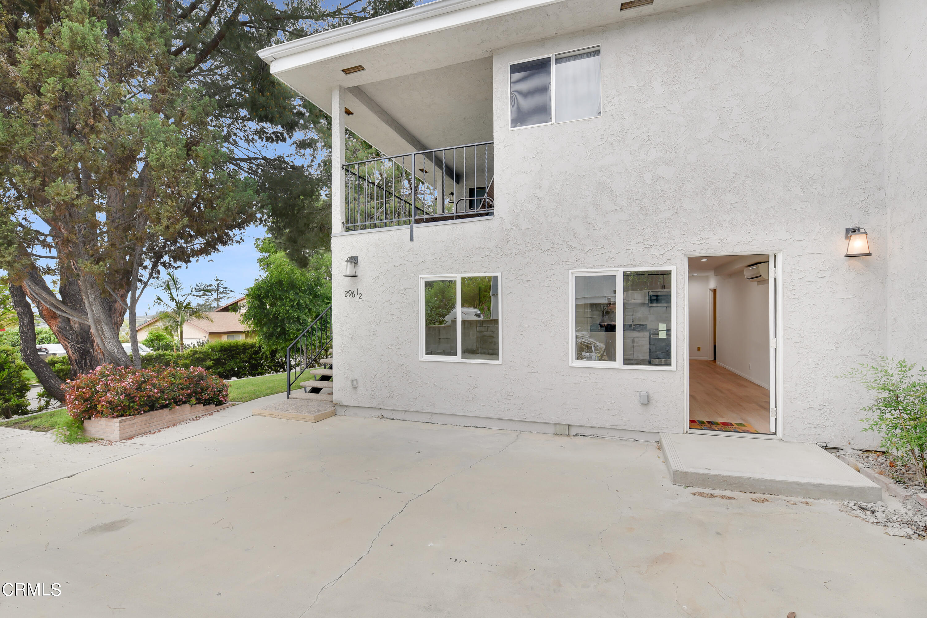 front view of a house with a street