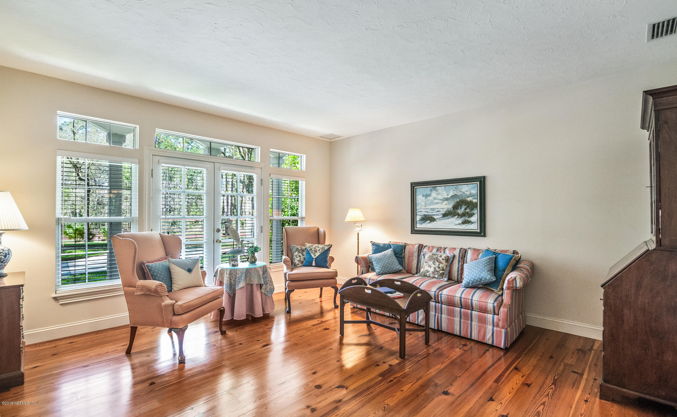 1435 Scott Road St. Johns, FL 32259 - Photo 11 of 65 a living room with furniture and a large window