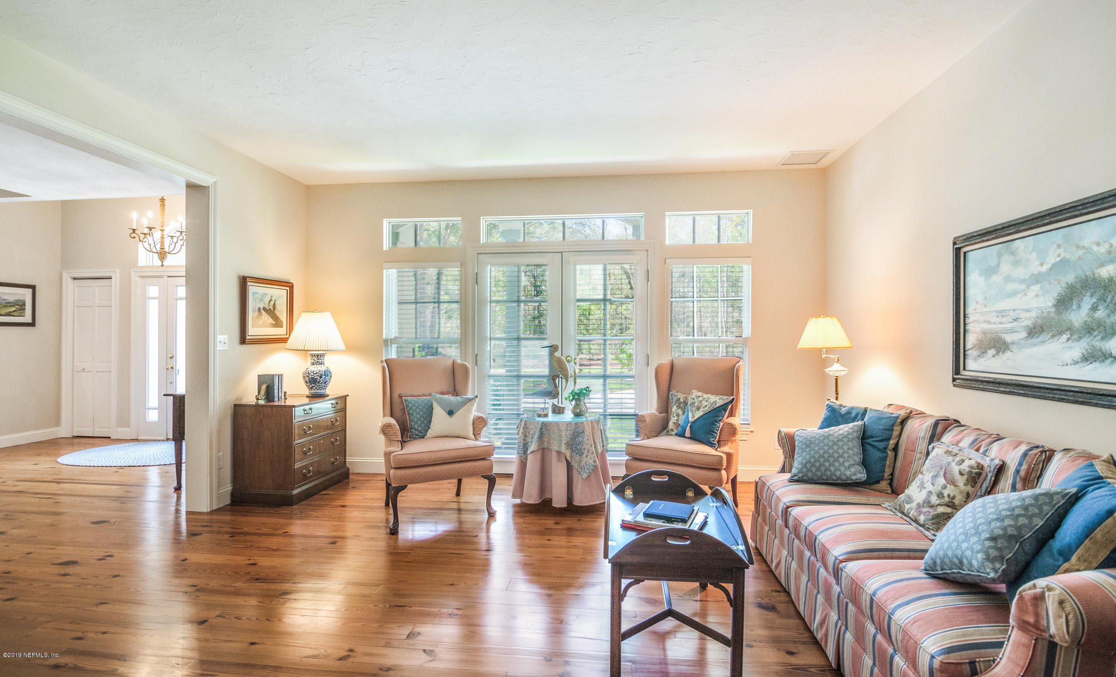 1435 Scott Road St. Johns, FL 32259 - Photo 12 of 65 a living room with furniture and a large window