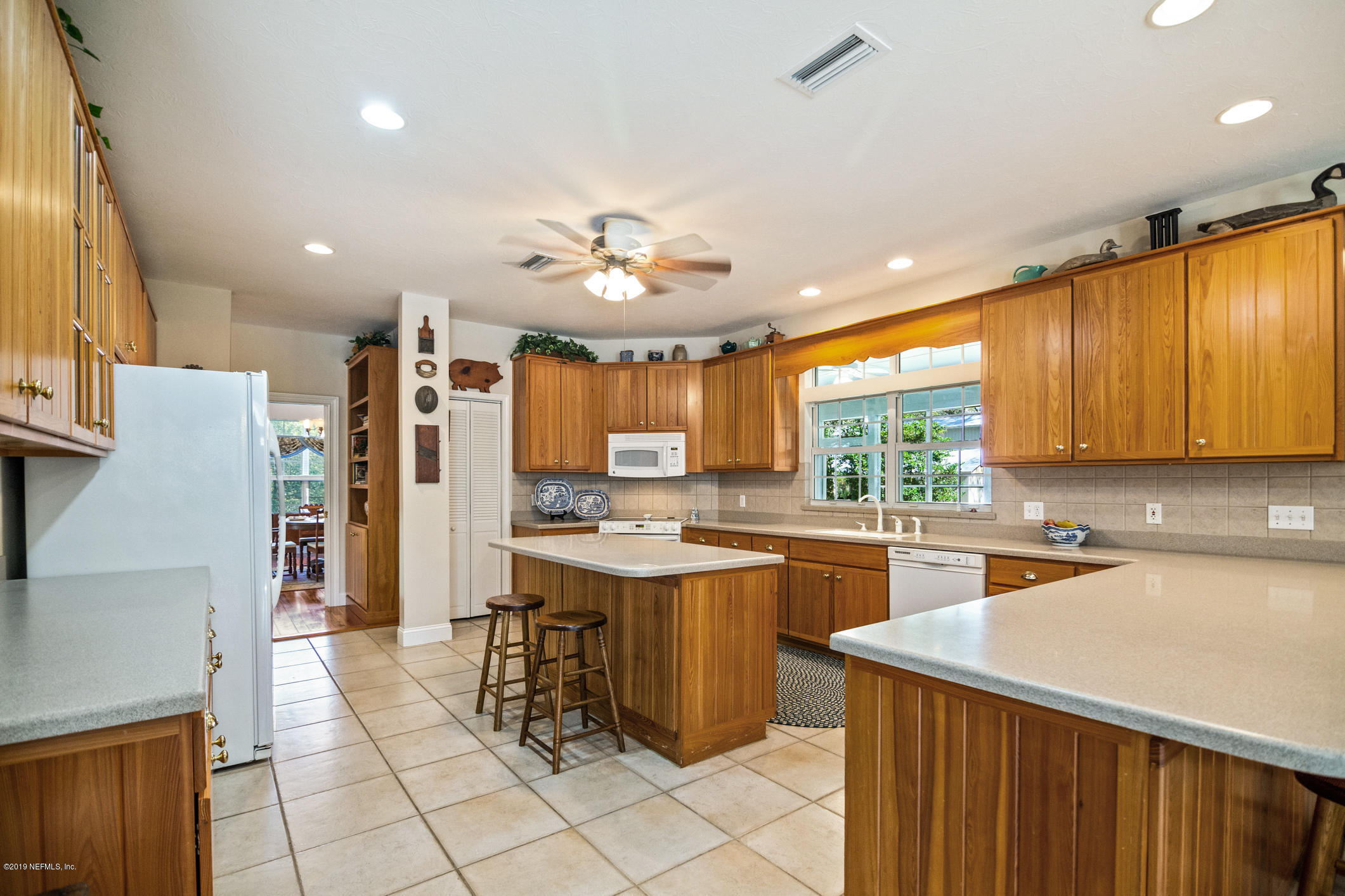 1435 Scott Road St. Johns, FL 32259 - Photo 14 of 65 a kitchen with a sink appliances and cabinets