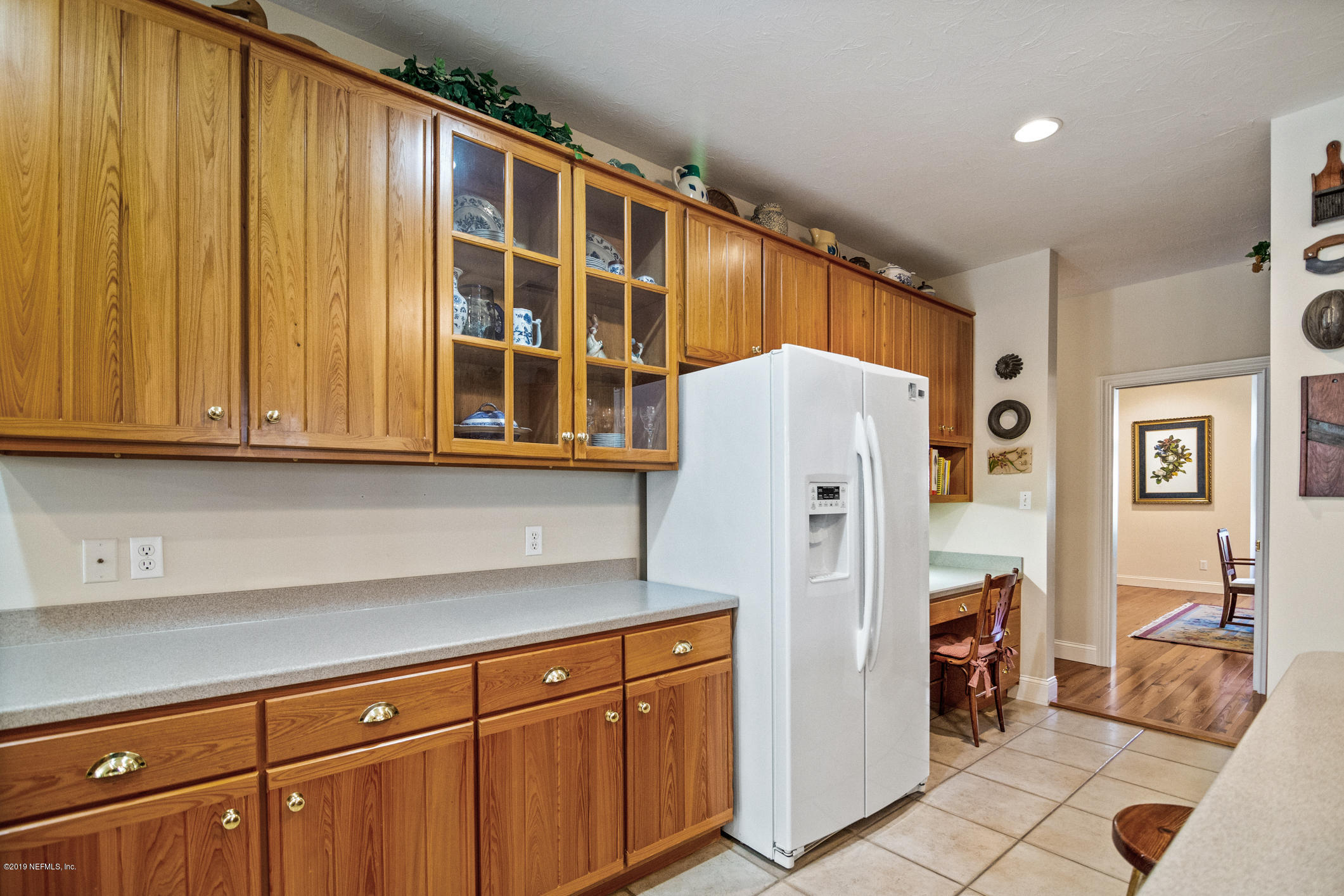 1435 Scott Road St. Johns, FL 32259 - Photo 16 of 65 a kitchen with stainless steel appliances granite countertop a refrigerator and a sink