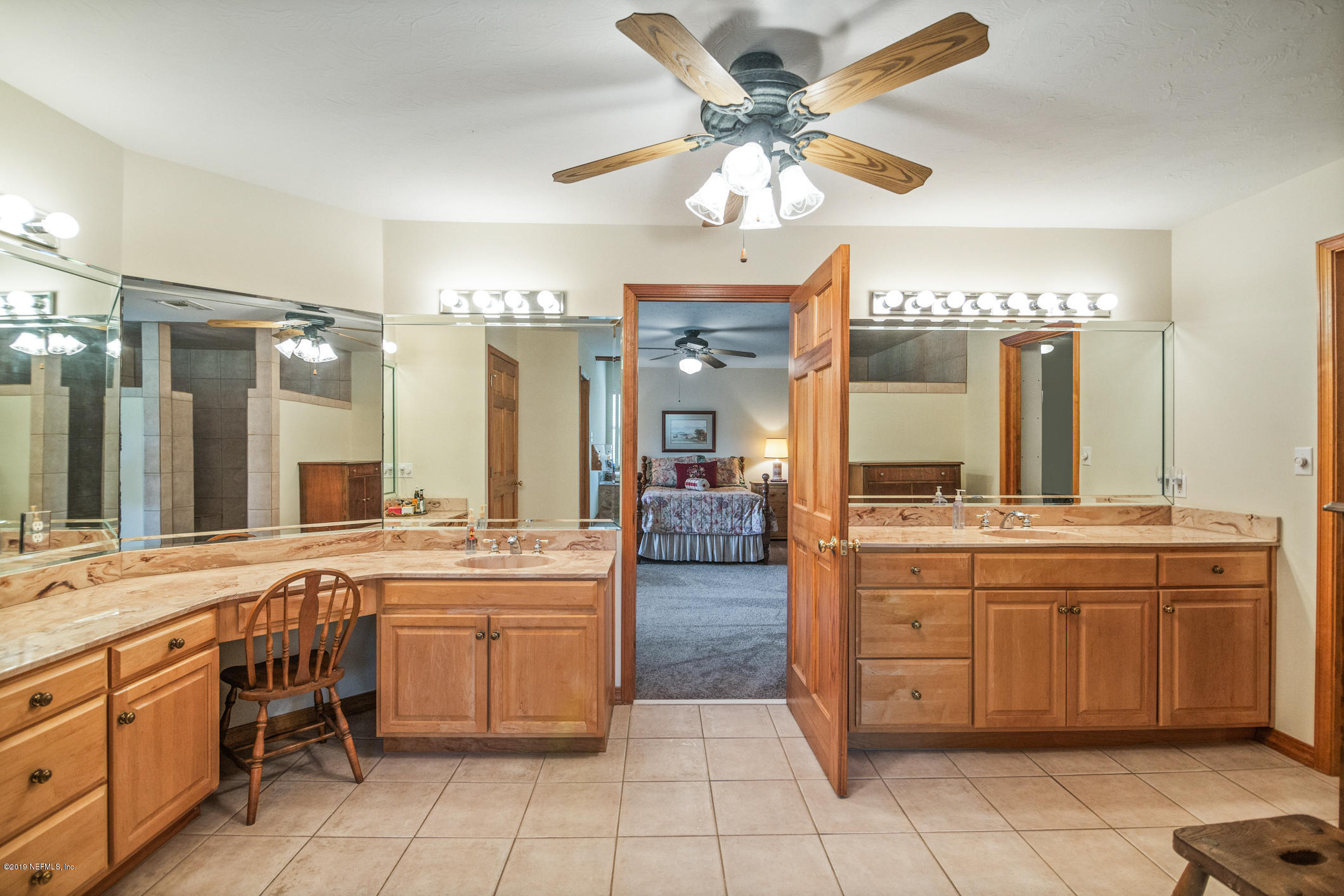 1435 Scott Road St. Johns, FL 32259 - Photo 23 of 65 a large kitchen with a large counter space appliances and cabinets