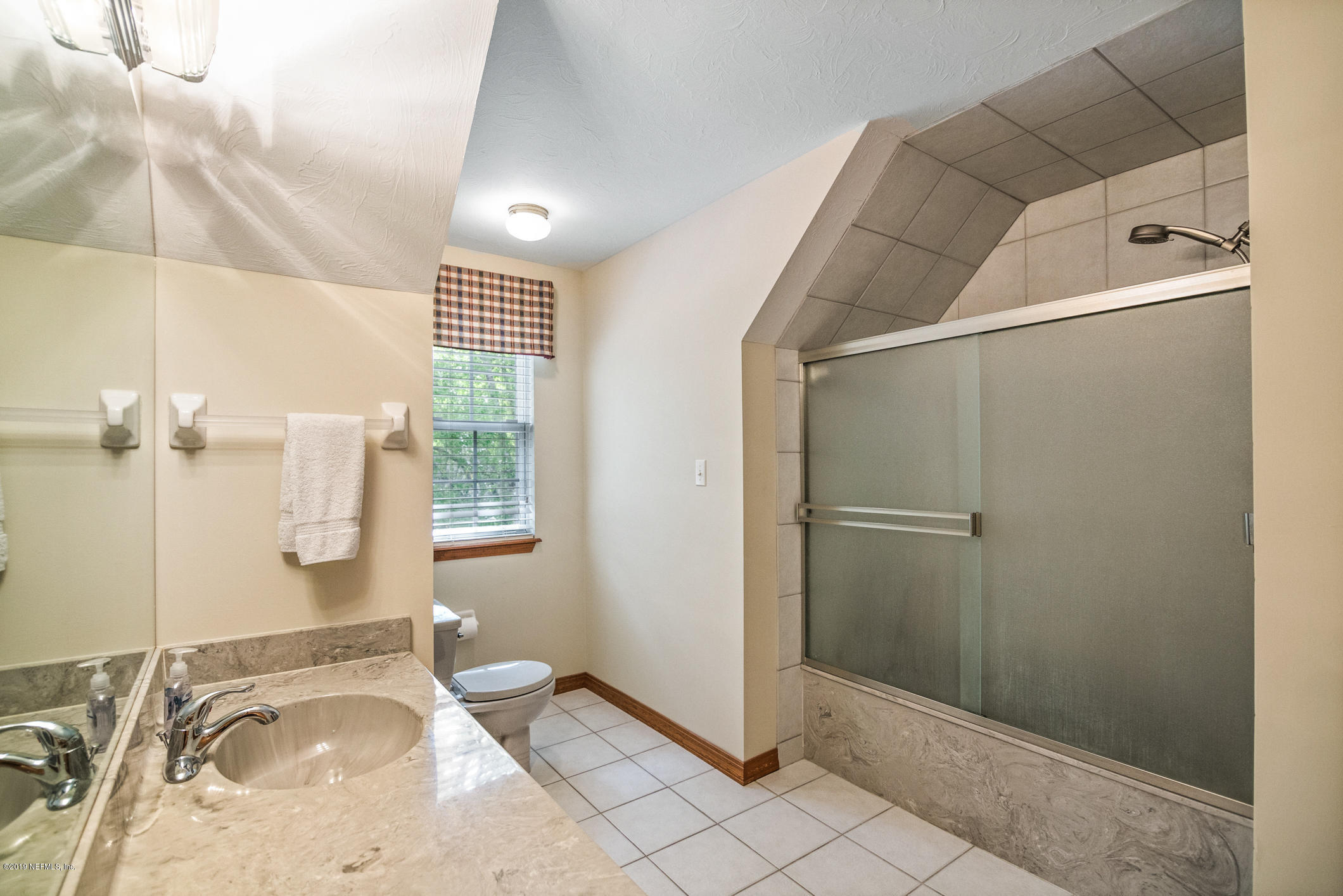 1435 Scott Road St. Johns, FL 32259 - Photo 30 of 65 a bathroom with a sink and granite