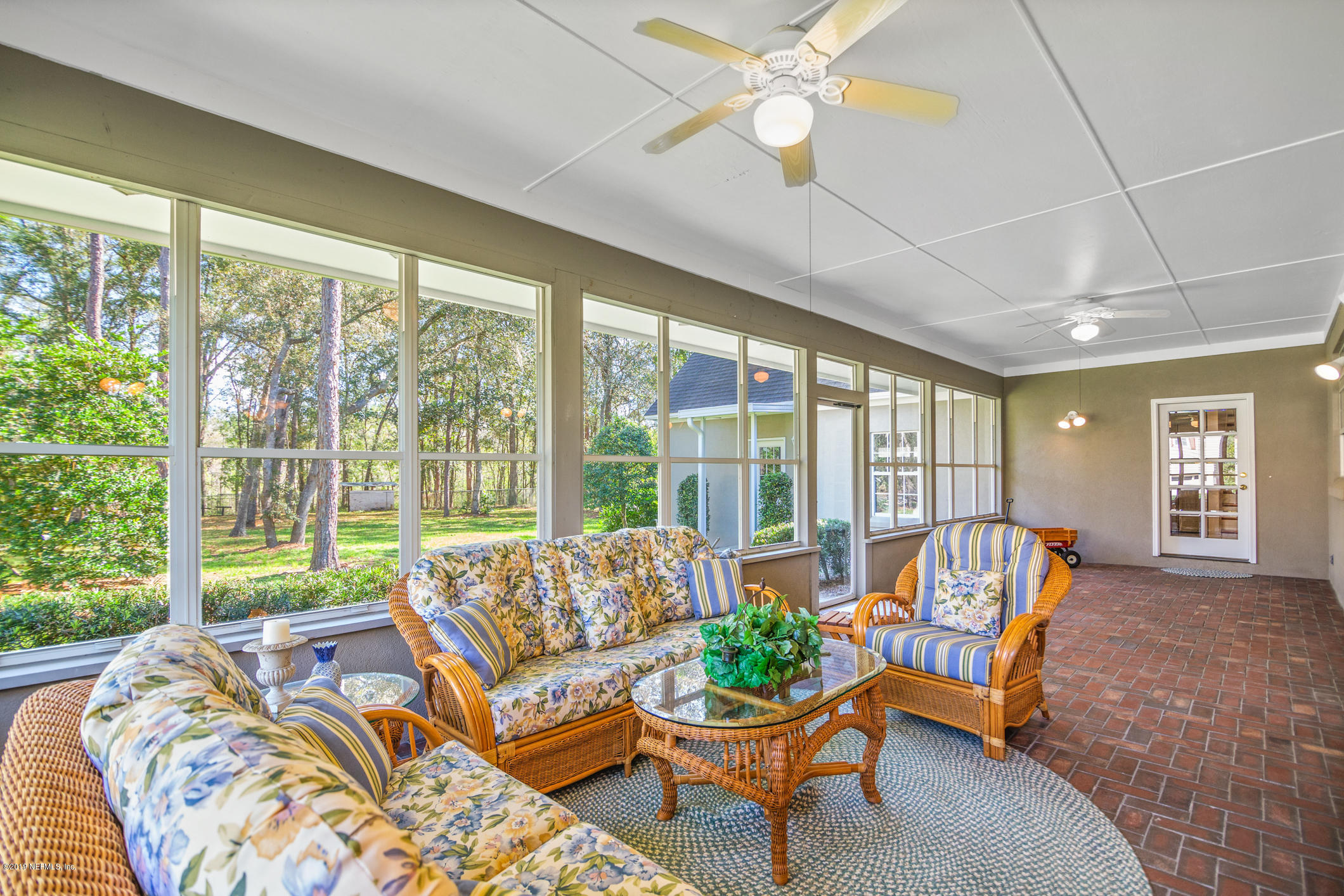 1435 Scott Road St. Johns, FL 32259 - Photo 35 of 65 a living room with furniture and a large window
