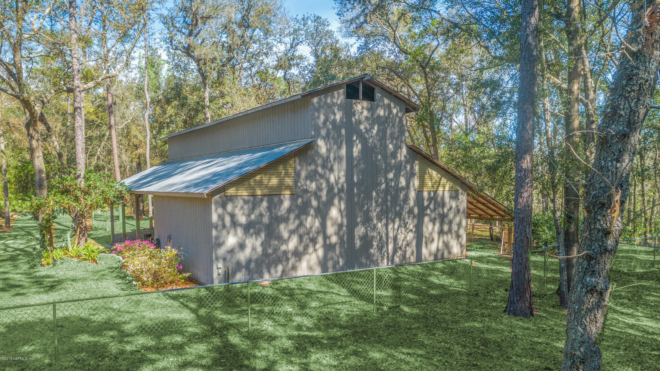 1435 Scott Road St. Johns, FL 32259 - Photo 36 of 65 a backyard of a house with lots of green space
