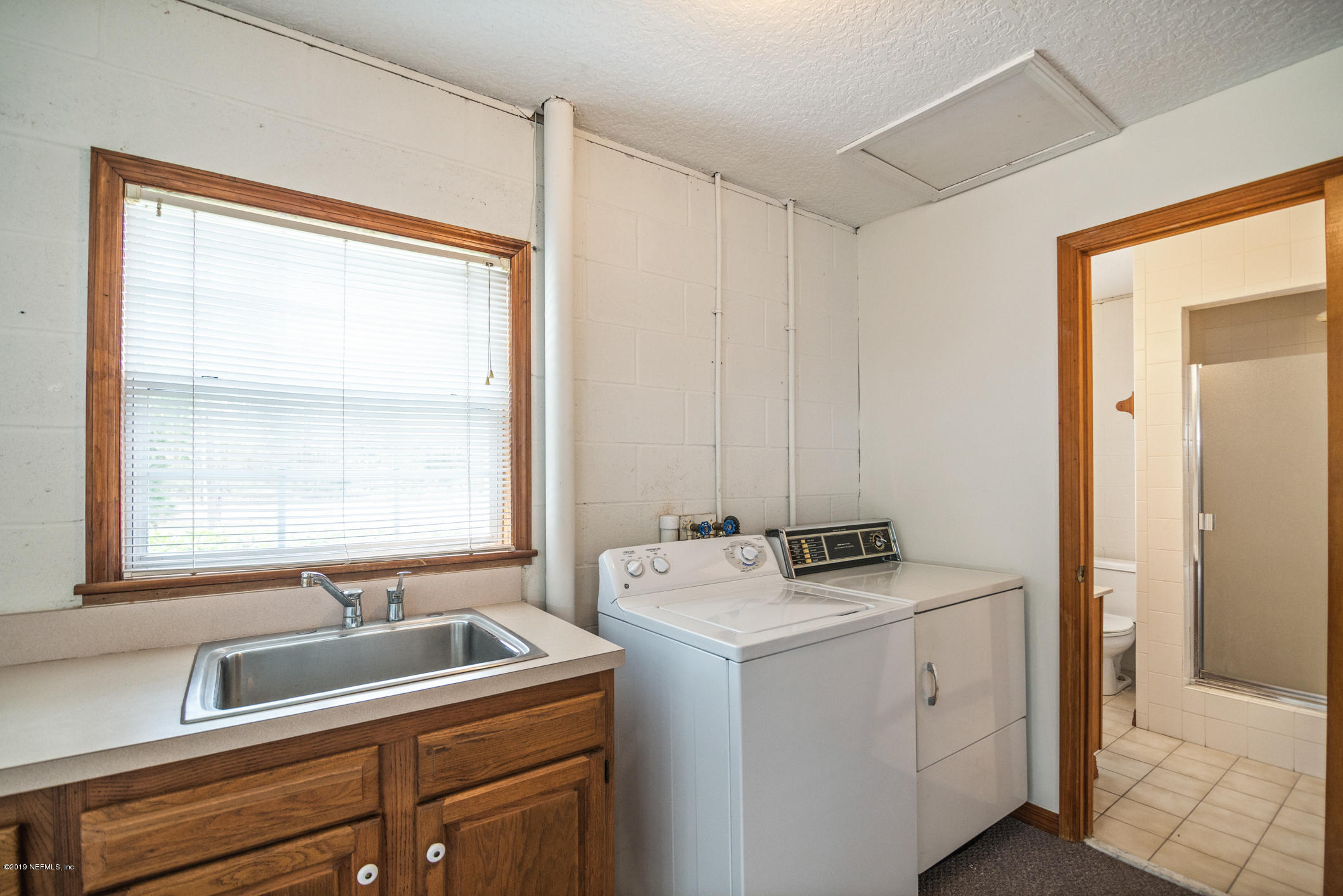 1435 Scott Road St. Johns, FL 32259 - Photo 43 of 65 a room with storage and utility