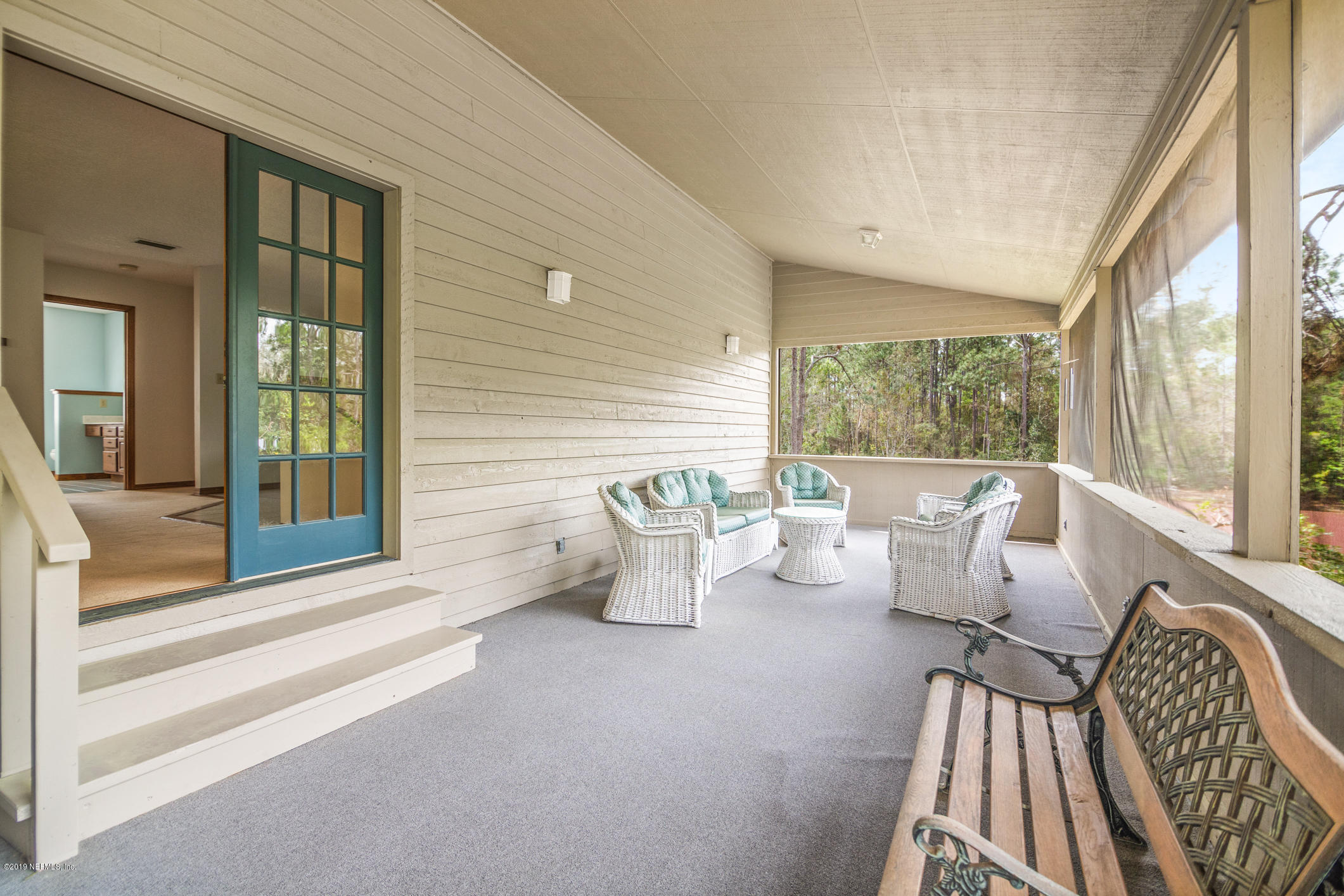 1435 Scott Road St. Johns, FL 32259 - Photo 52 of 65 a living room with furniture and a large window