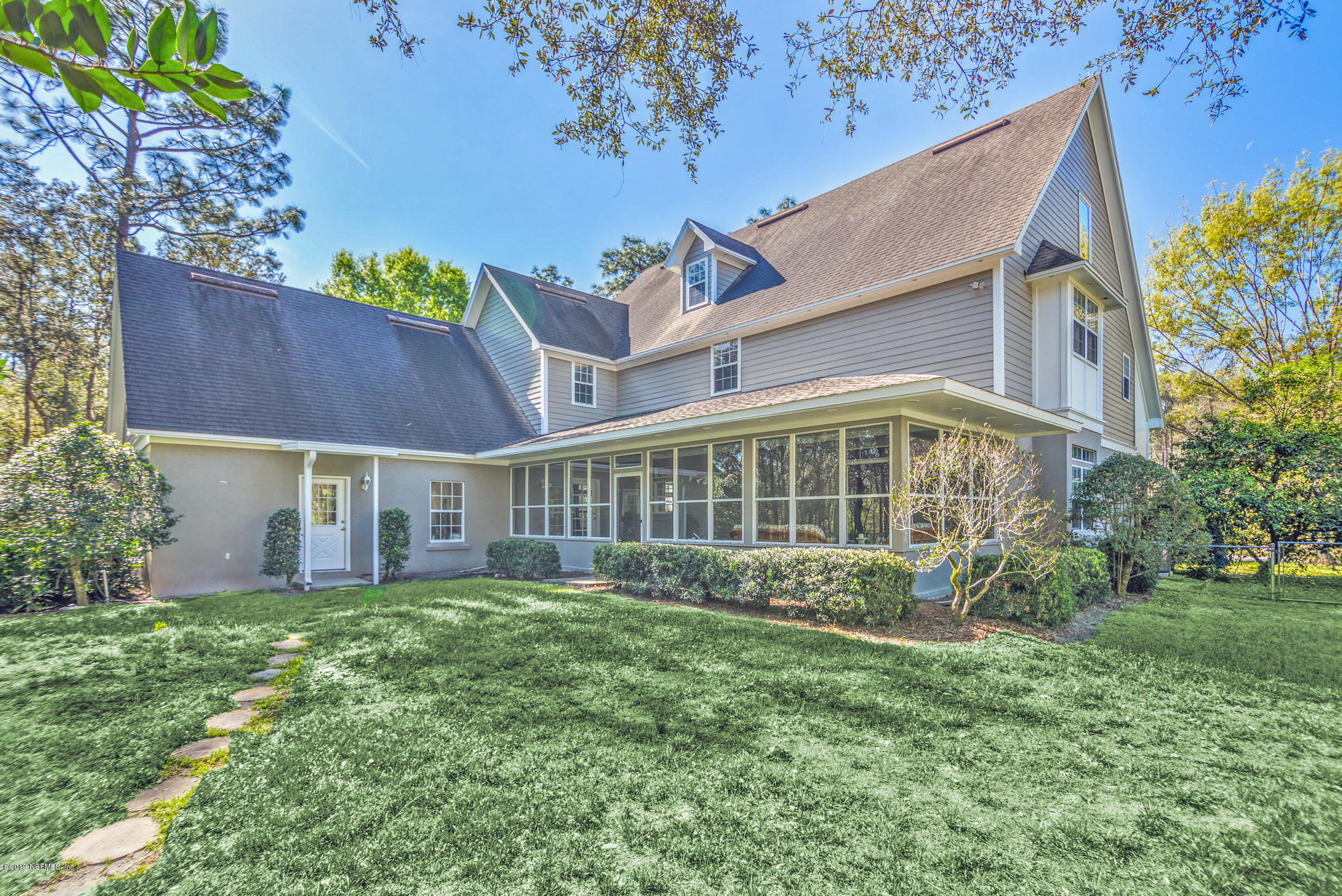 1435 Scott Road St. Johns, FL 32259 - Photo 54 of 65 front view of a house with a yard