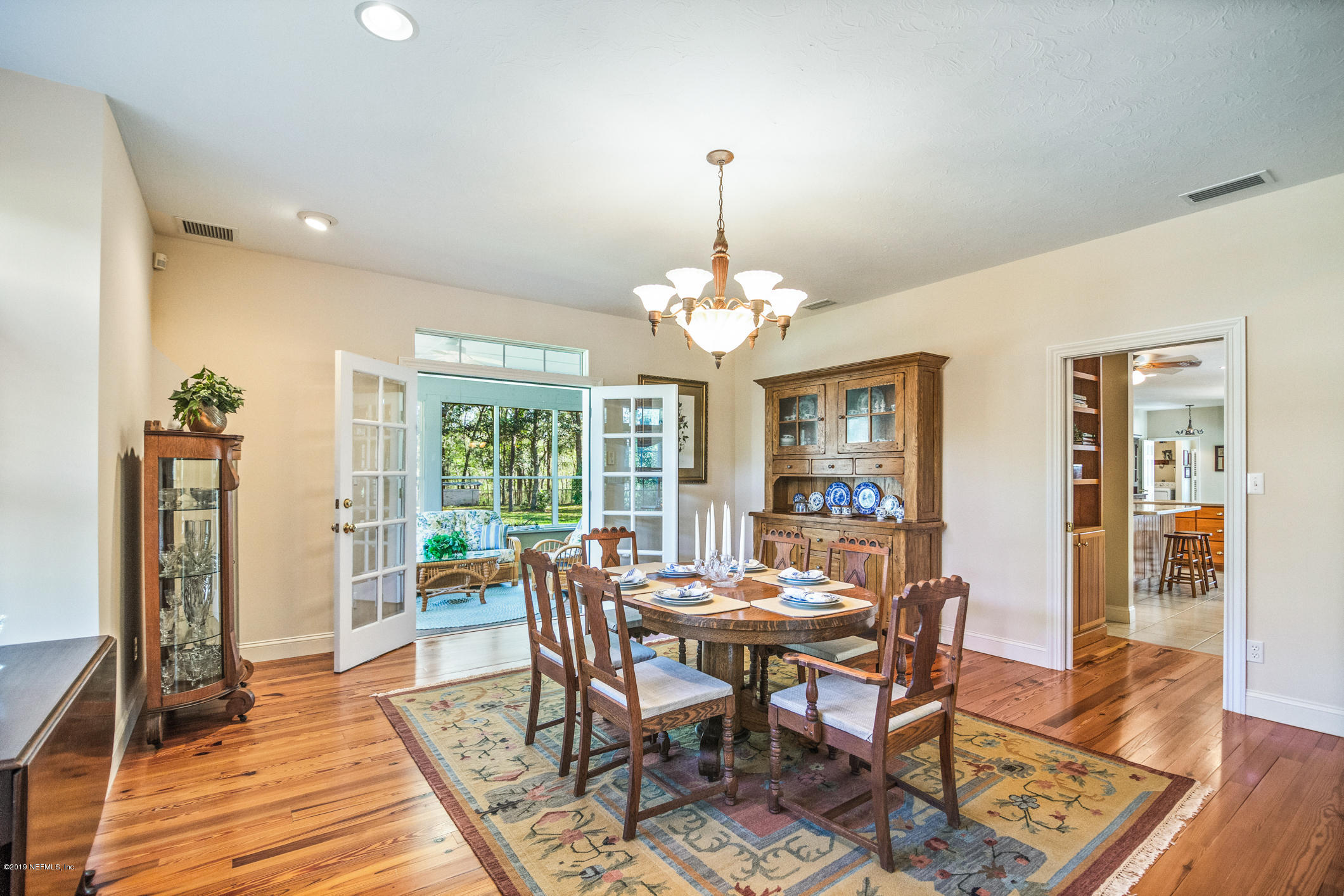 1435 Scott Road St. Johns, FL 32259 - Photo 7 of 65 a view of a dining room with furniture window and wooden floor