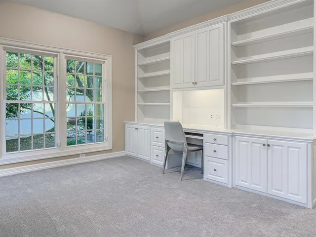 a room with furniture and a window