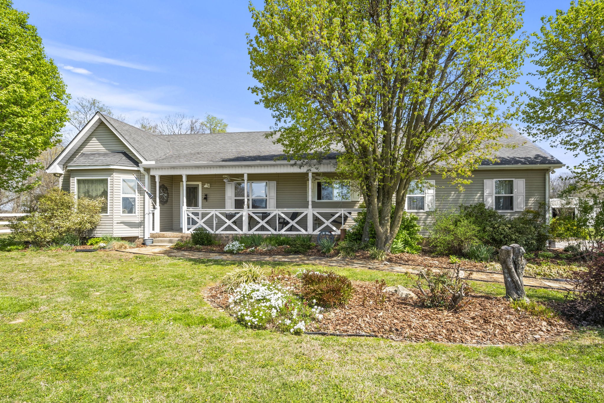 4760 Barren Plains Road Springfield, TN 37172 - Photo 14 of 47 a front view of a house with swimming pool and porch
