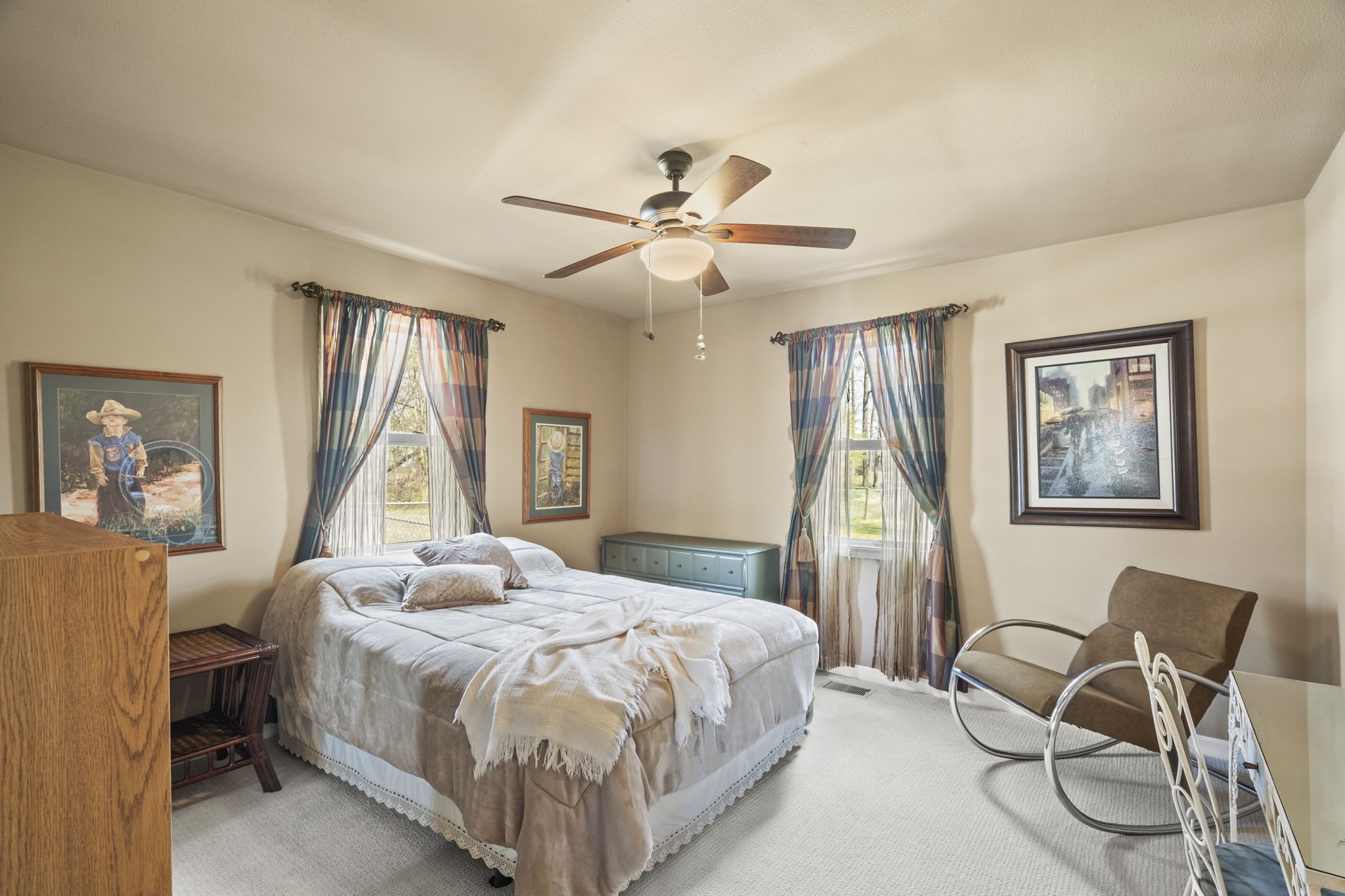 4760 Barren Plains Road Springfield, TN 37172 - Photo 16 of 47 a bedroom with a bed chairs and a window