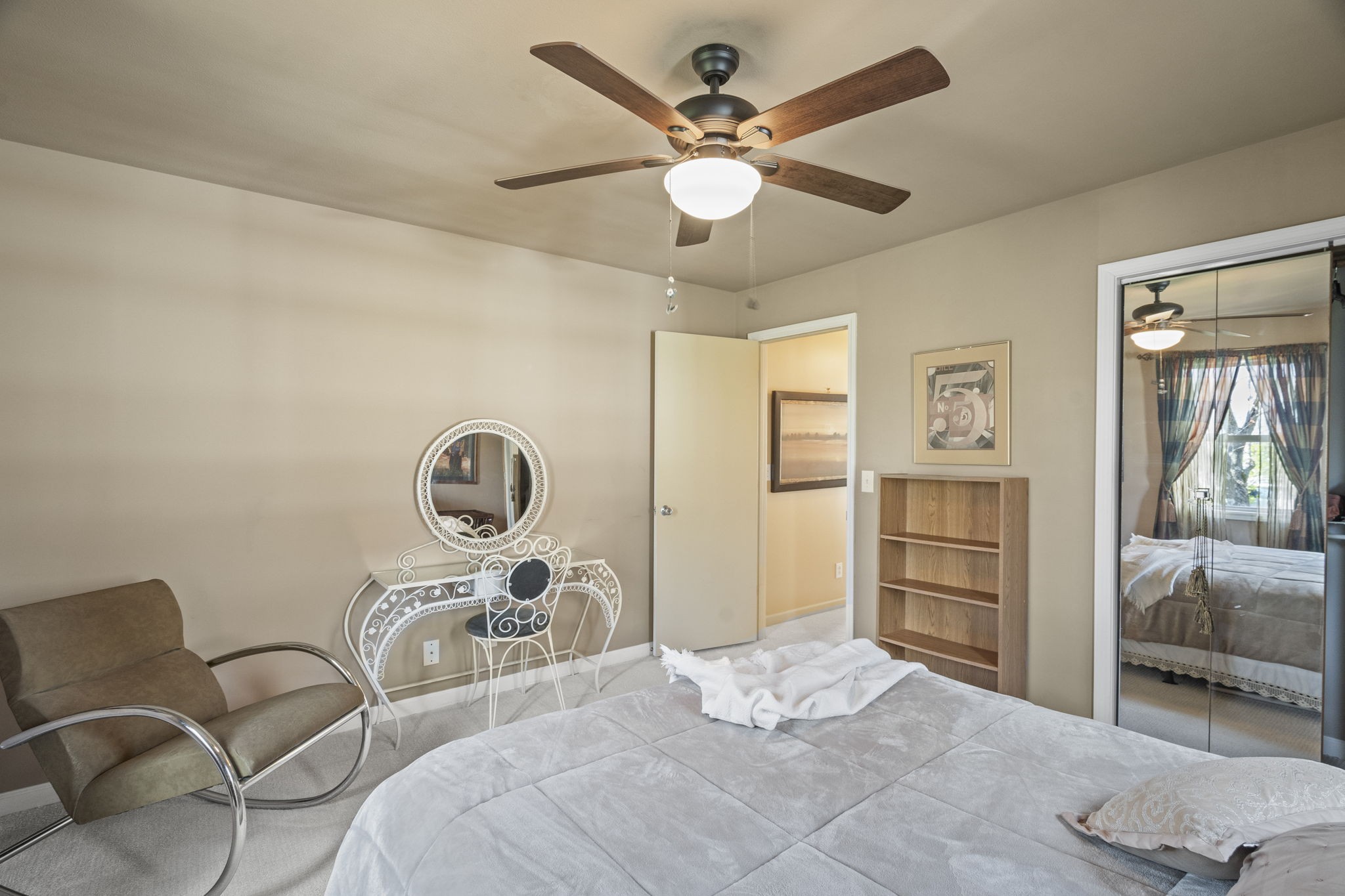 4760 Barren Plains Road Springfield, TN 37172 - Photo 17 of 47 a bedroom with a bed and a chandelier