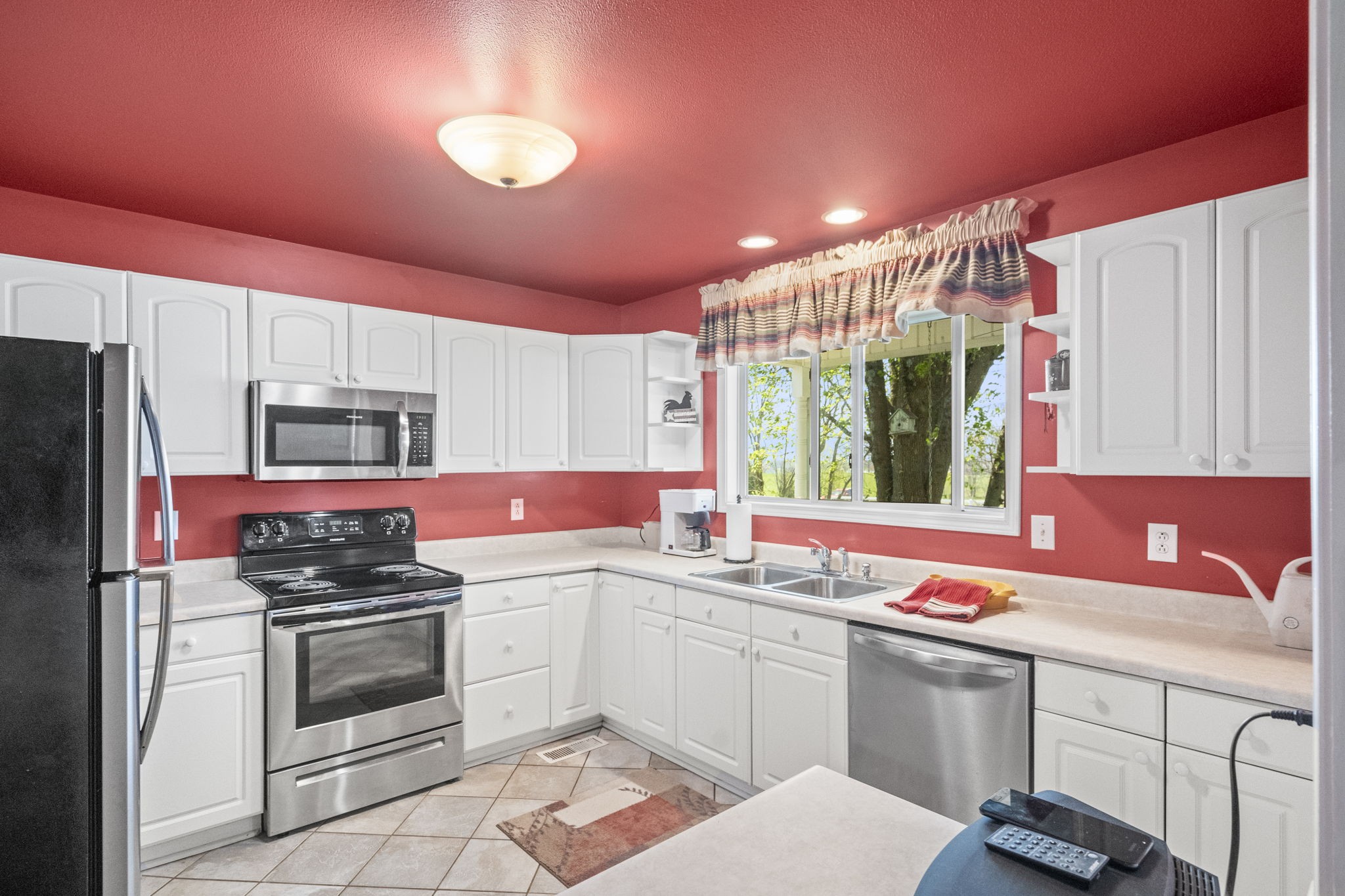 4760 Barren Plains Road Springfield, TN 37172 - Photo 30 of 47 a kitchen with a sink cabinets and stainless steel appliances