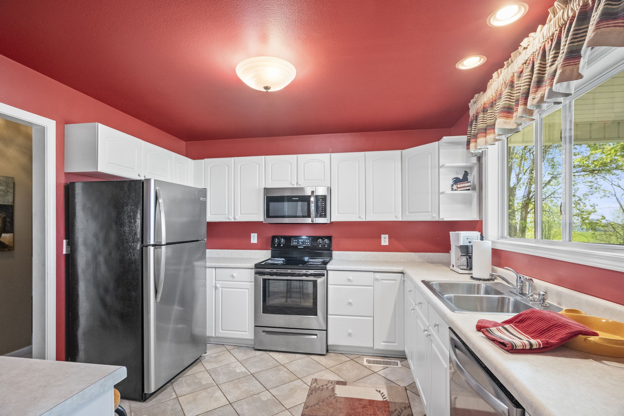 4760 Barren Plains Road Springfield, TN 37172 - Photo 31 of 47 a kitchen with a sink stove and refrigerator