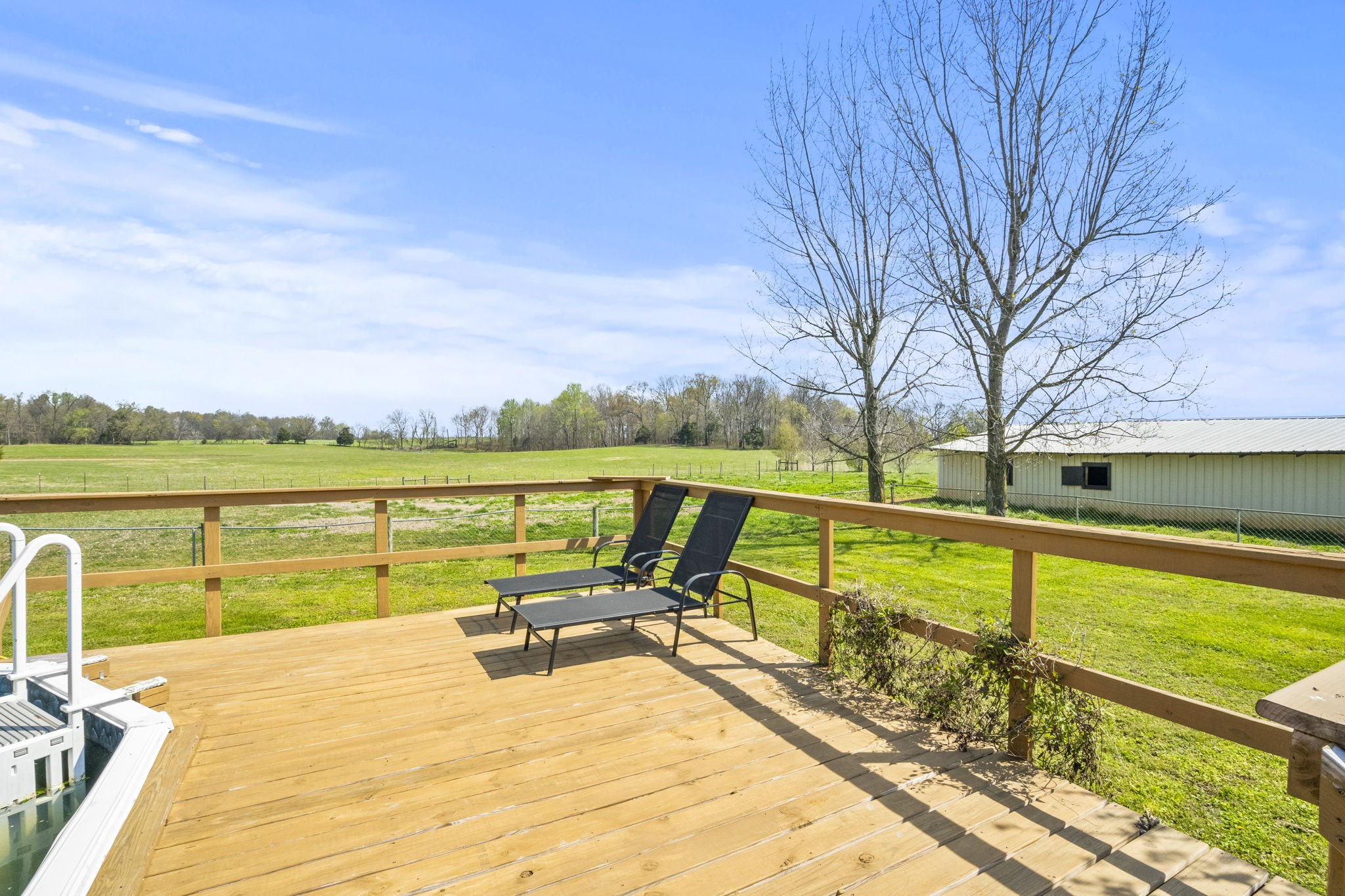 4760 Barren Plains Road Springfield, TN 37172 - Photo 38 of 47 a view of swimming pool with outdoor seating and lake view