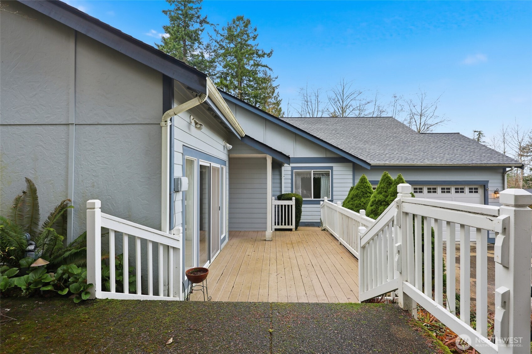1083 5th Street Steilacoom, WA 98388 - Photo 23 of 39 a view of a house with wooden fence