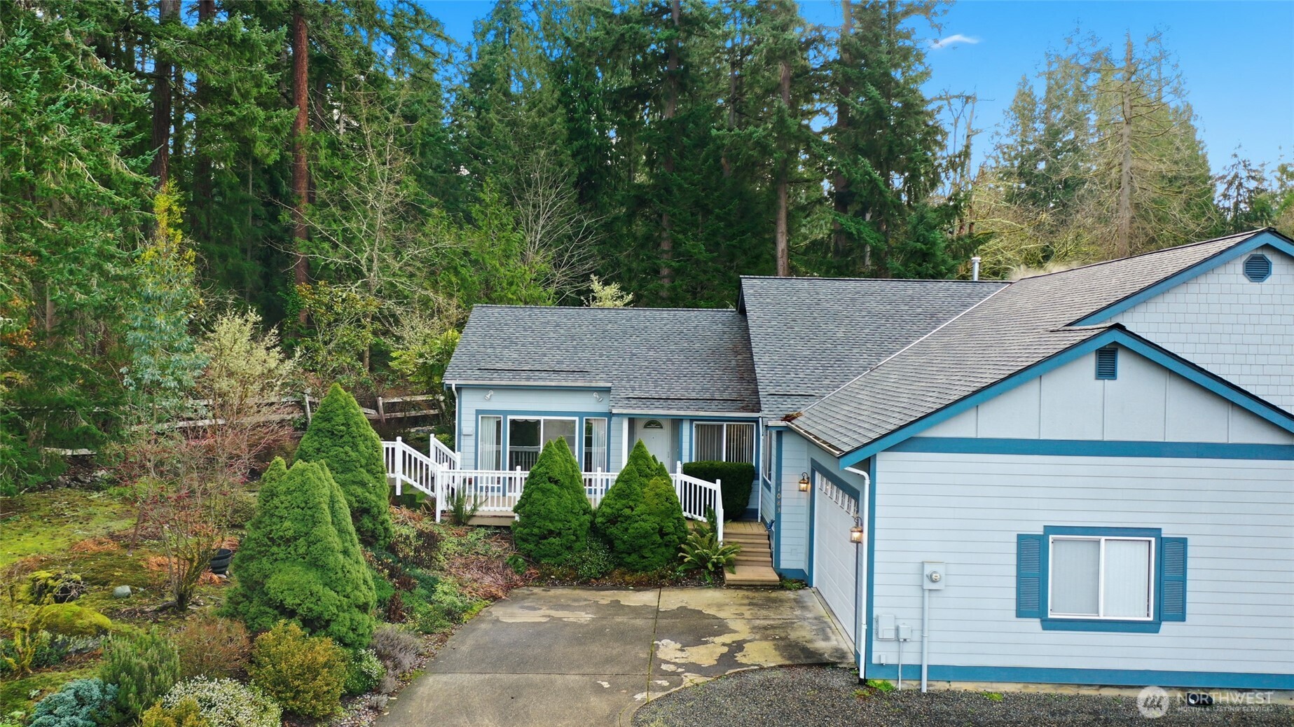 1083 5th Street Steilacoom, WA 98388 - Photo 34 of 39 a house that has a tree in front of it