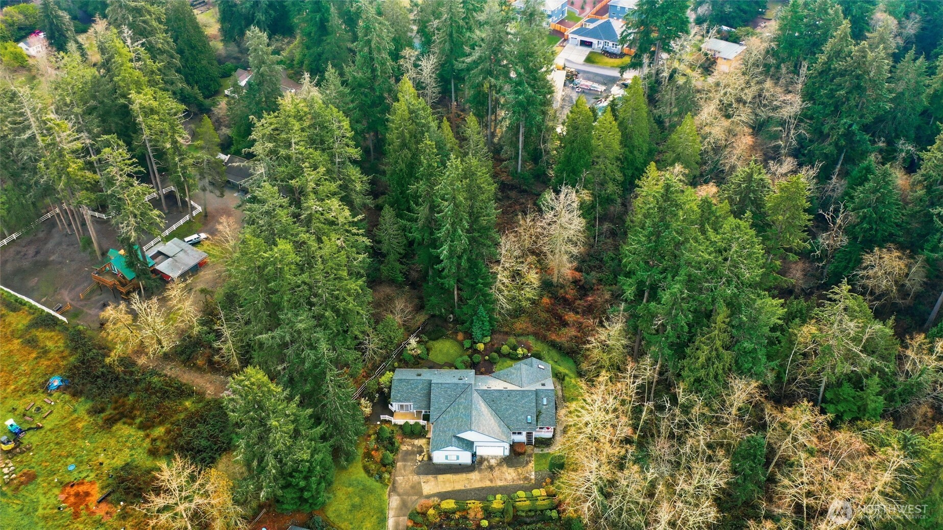1083 5th Street Steilacoom, WA 98388 - Photo 39 of 39 an aerial view of a house with a yard