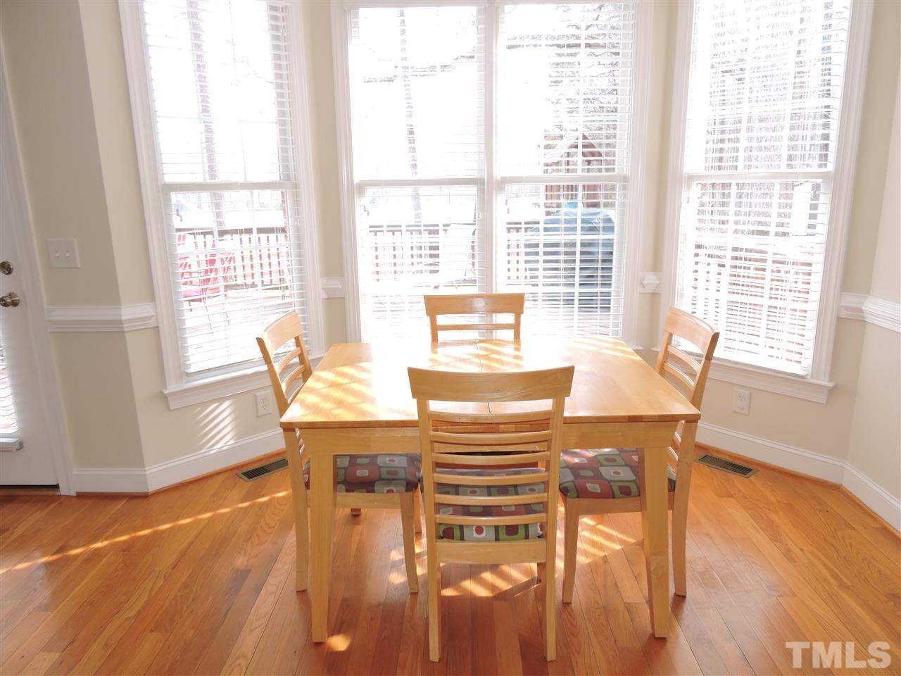 187 North Old Lantern Road Timberlake, NC 27583 - Photo 11 of 25 a dining room with furniture and wooden floor