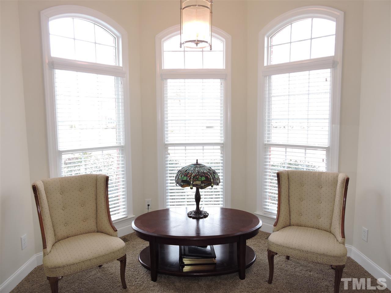 187 North Old Lantern Road Timberlake, NC 27583 - Photo 13 of 25 a living room with furniture and a large window