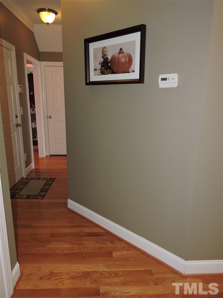 187 North Old Lantern Road Timberlake, NC 27583 - Photo 19 of 25 a view of a hallway with wooden floor
