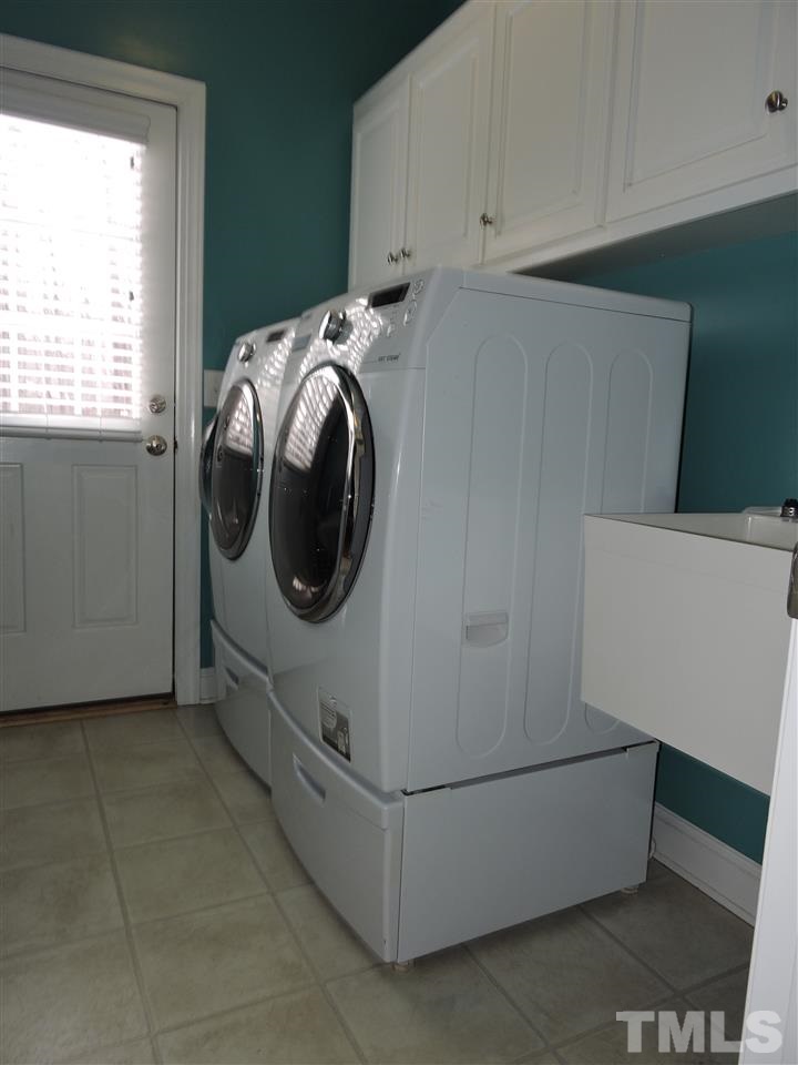 187 North Old Lantern Road Timberlake, NC 27583 - Photo 20 of 25 a utility room with dryer and washer