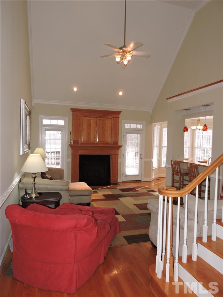 187 North Old Lantern Road Timberlake, NC 27583 - Photo 8 of 25 a living room with furniture and a fireplace