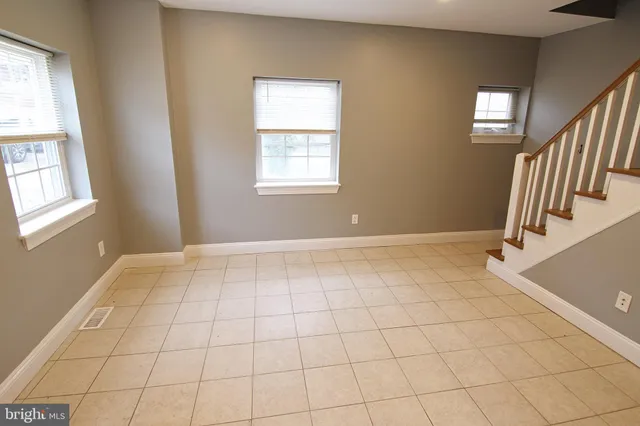 a view of an empty room and window