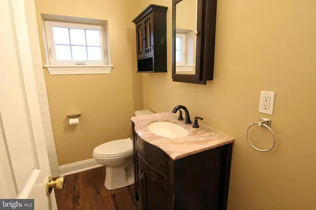 a bathroom with a sink and a toilet