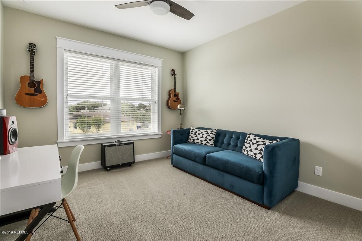 80 Ferrol Road St. Augustine, FL 32084 - Photo 22 of 32 a living room with furniture and a window