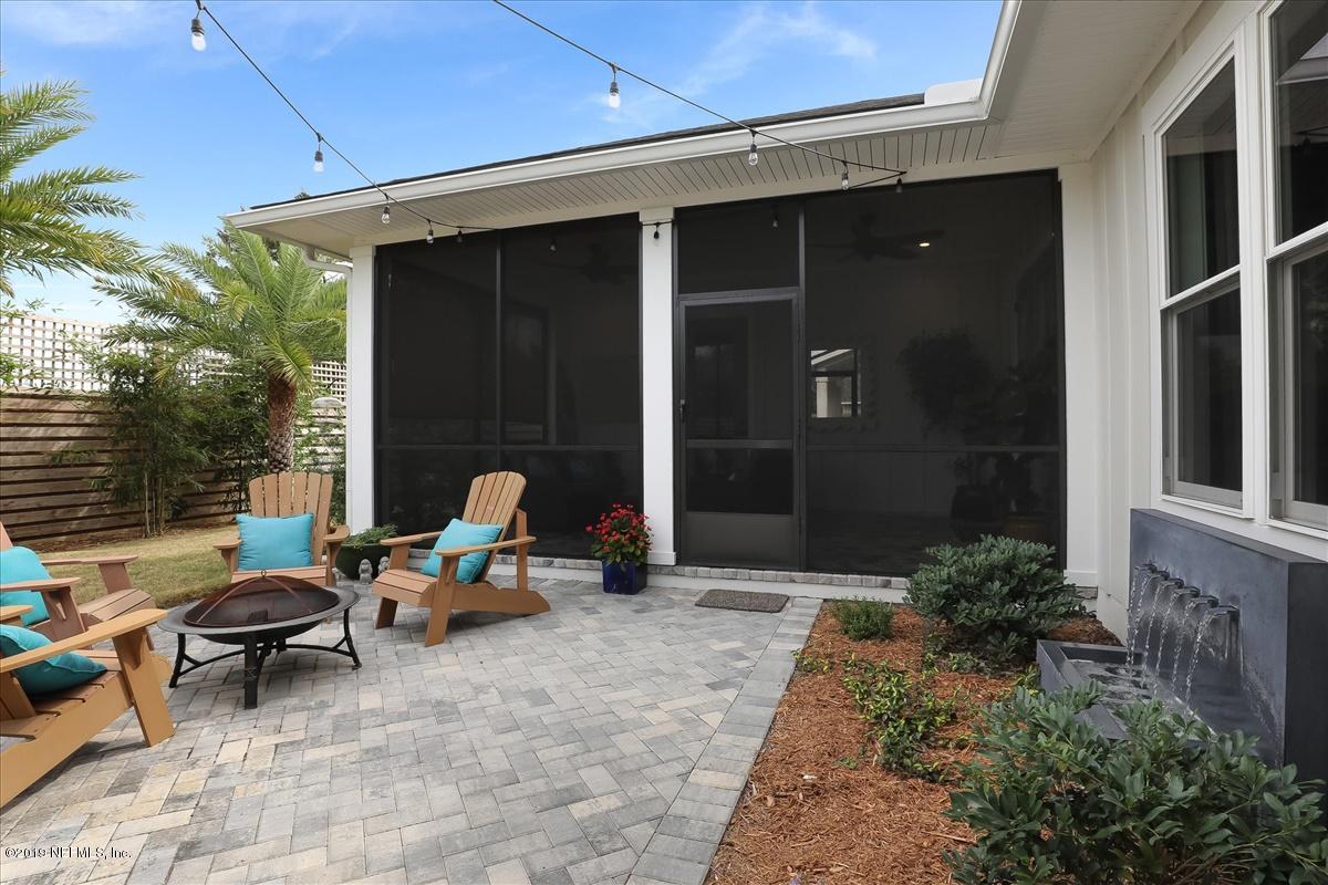 80 Ferrol Road St. Augustine, FL 32084 - Photo 24 of 32 a backyard of a house with outdoor seating