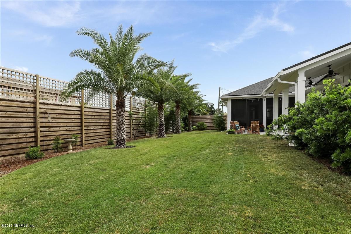 80 Ferrol Road St. Augustine, FL 32084 - Photo 28 of 32 a front view of house with yard and green space