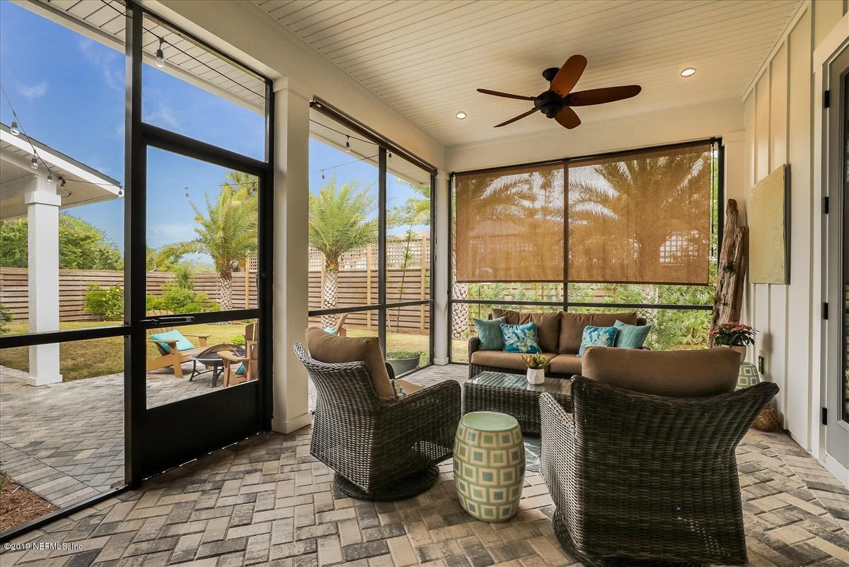 80 Ferrol Road St. Augustine, FL 32084 - Photo 29 of 32 a living room with furniture and a large window