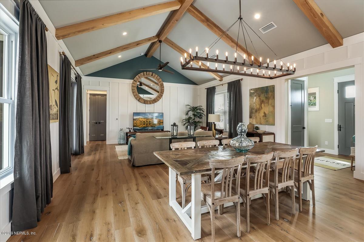 80 Ferrol Road St. Augustine, FL 32084 - Photo 8 of 32 a view of a dining room with furniture and a chandelier