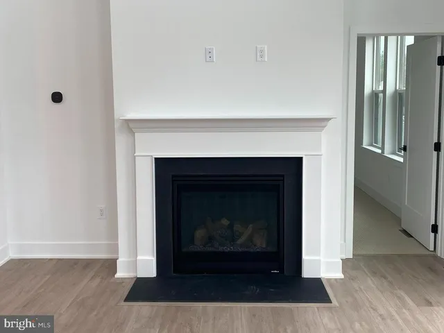 a living room with a fireplace
