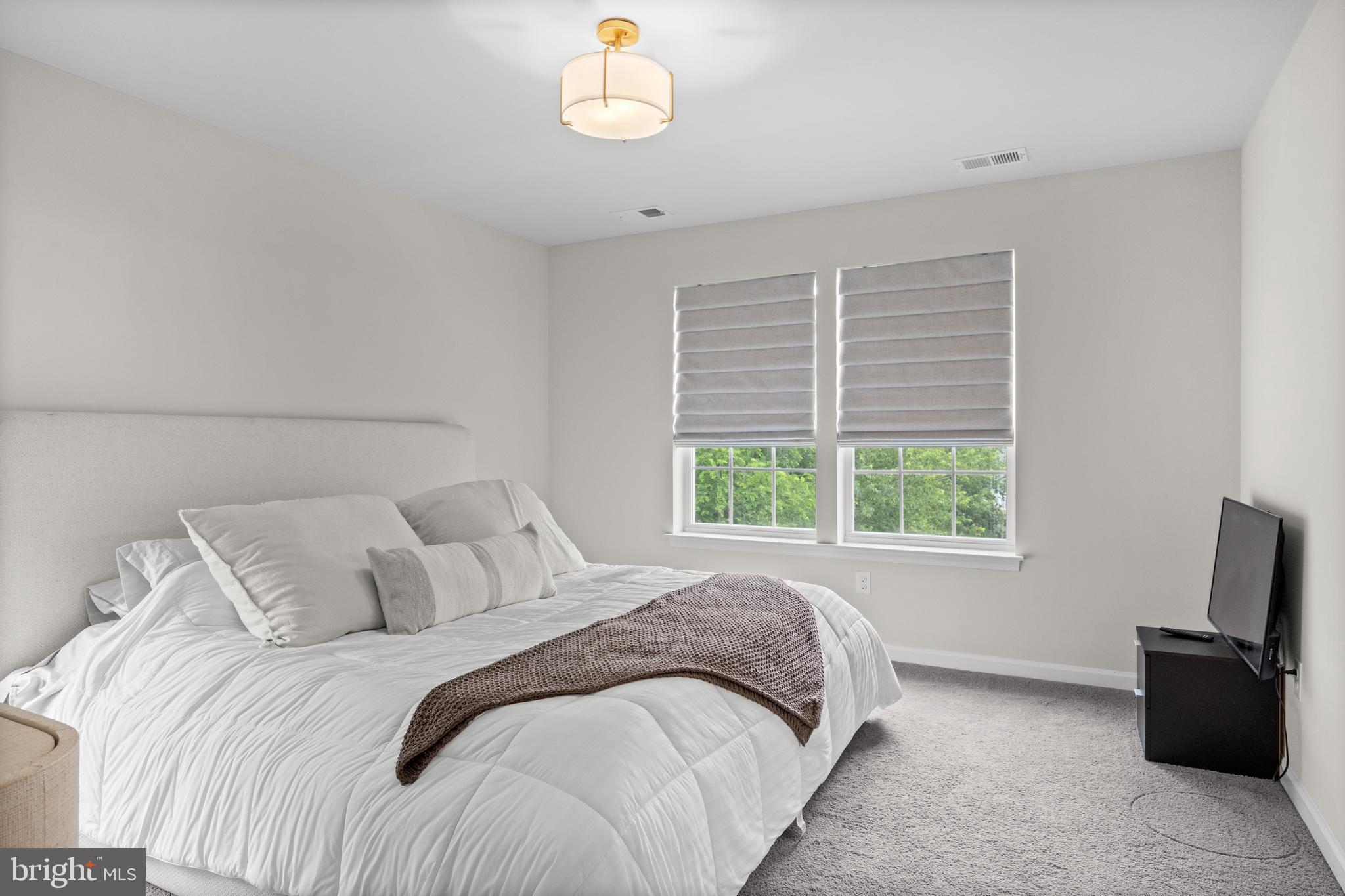 414 Monte Farm Road Mount Laurel, NJ 08054 - Photo 15 of 27 a bedroom with a bed and a window