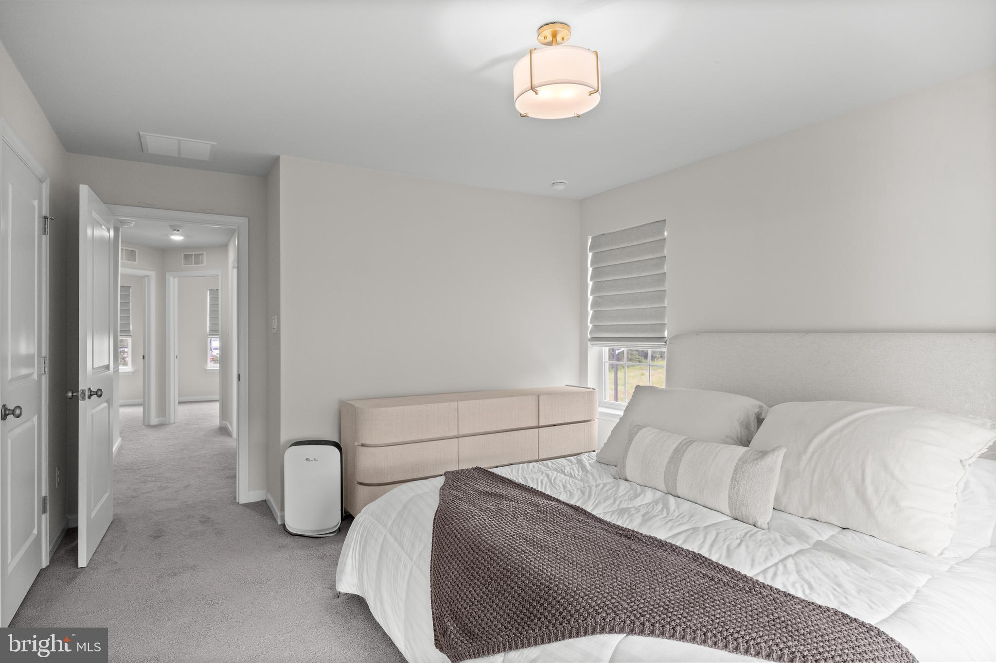 414 Monte Farm Road Mount Laurel, NJ 08054 - Photo 16 of 27 a bedroom with a bed and walk in closet