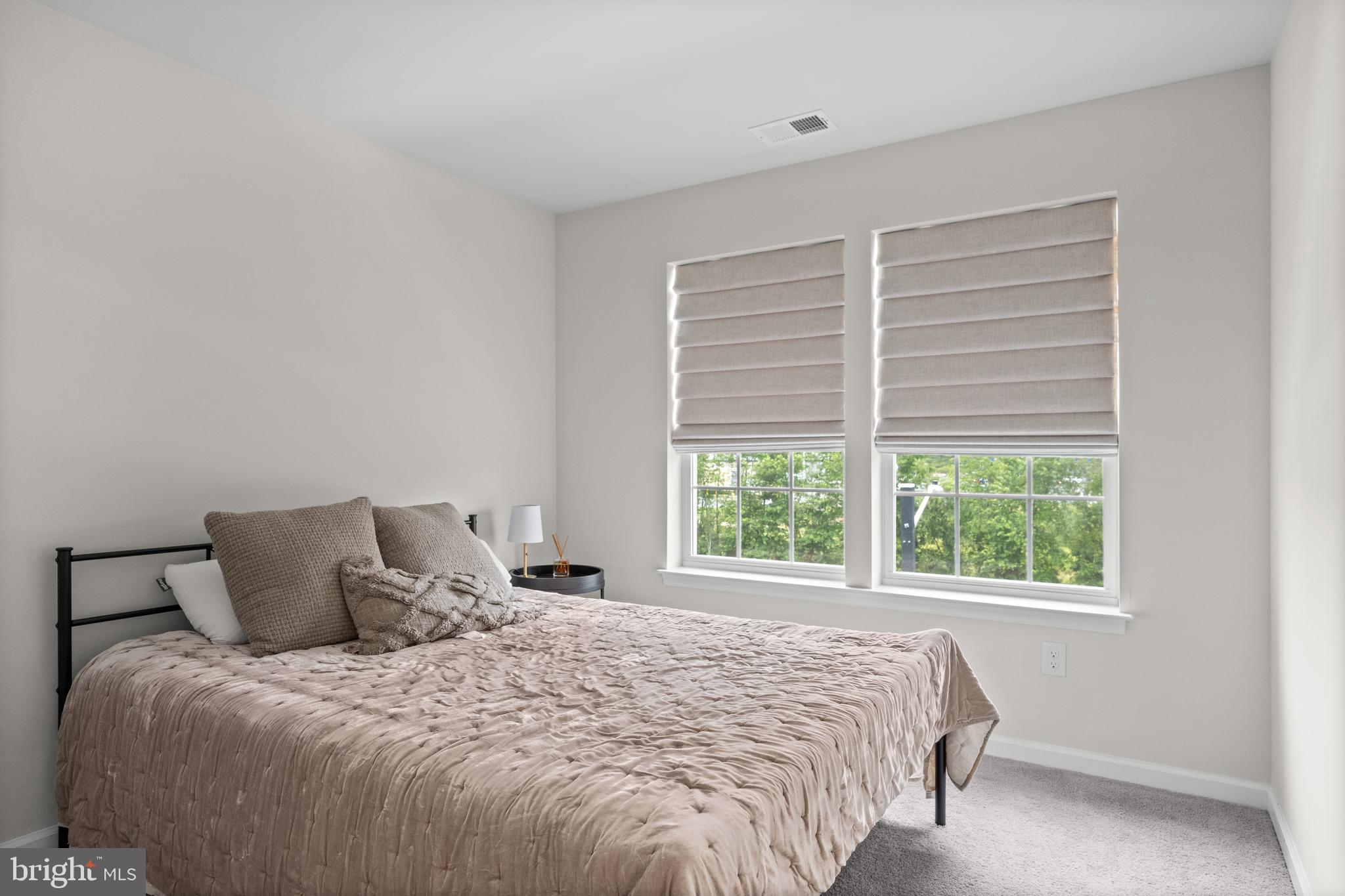 414 Monte Farm Road Mount Laurel, NJ 08054 - Photo 20 of 27 a large bed sitting in a bedroom next to a window