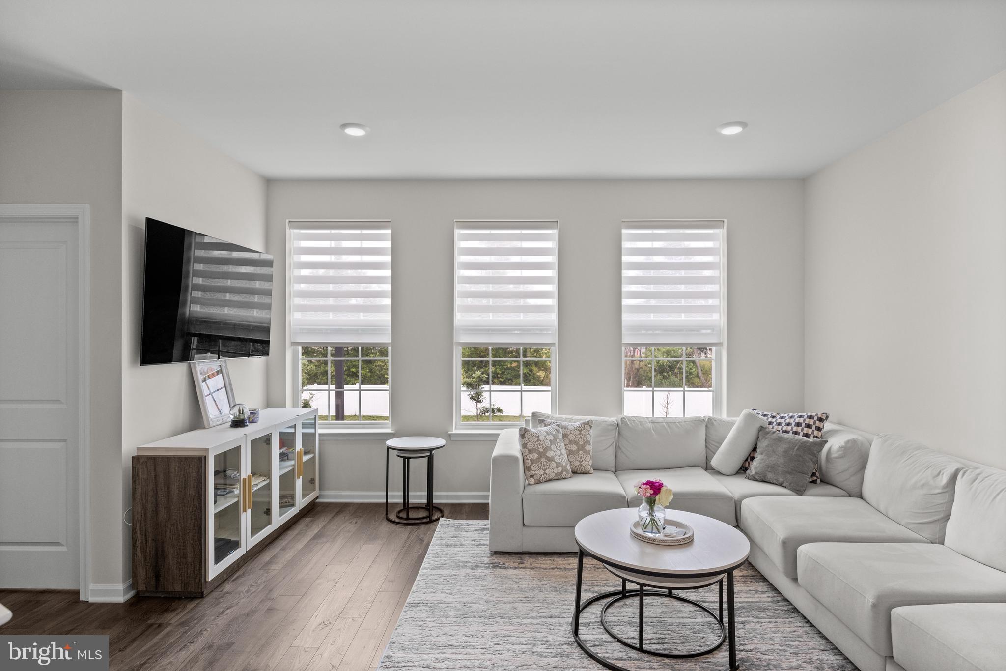 414 Monte Farm Road Mount Laurel, NJ 08054 - Photo 8 of 27 a living room with furniture and a flat screen tv