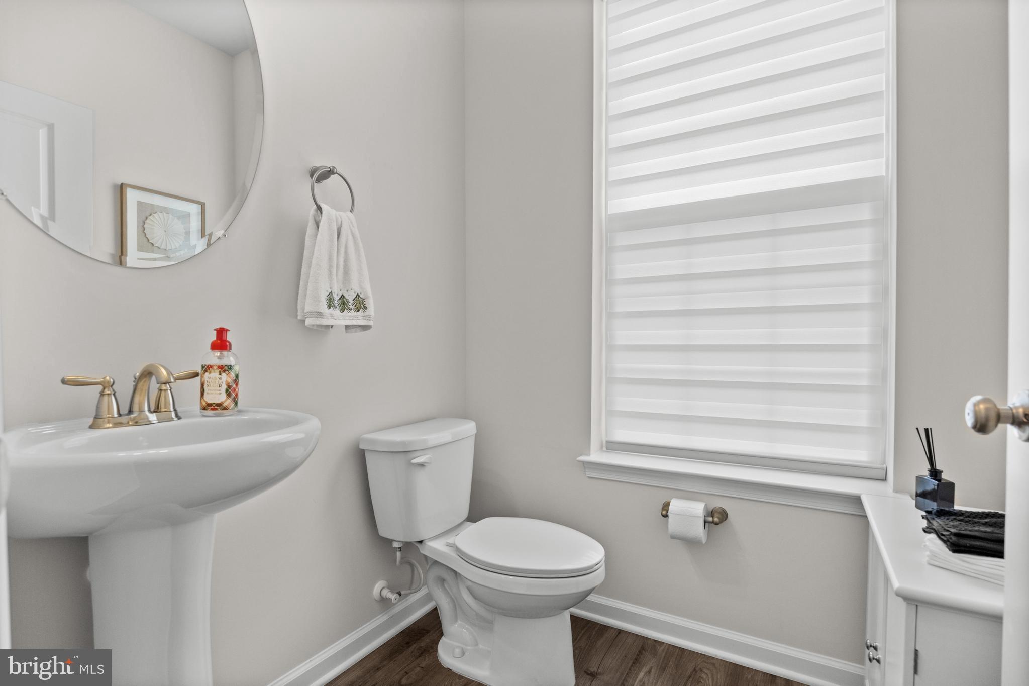 414 Monte Farm Road Mount Laurel, NJ 08054 - Photo 10 of 27 a bathroom with a sink toilet and a mirror