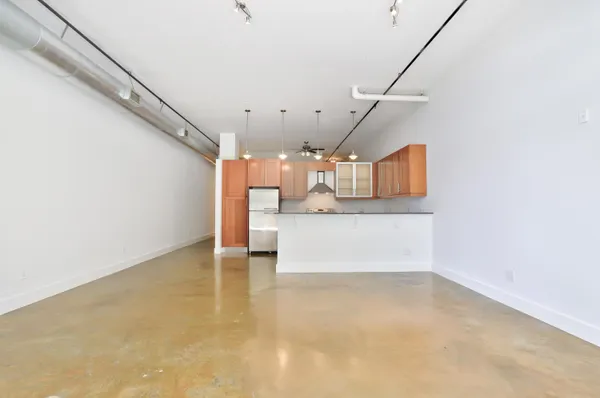a view of a kitchen with a sink