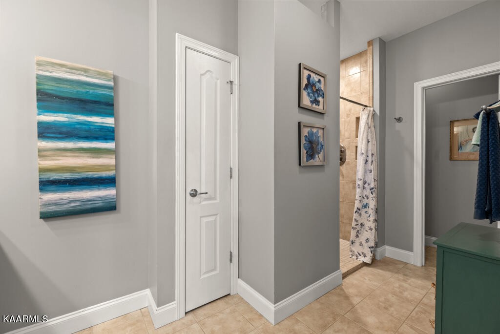 2582 Meadow Road West Greenback, TN 37742 - Photo 22 of 60 a view of a hallway with windows and door