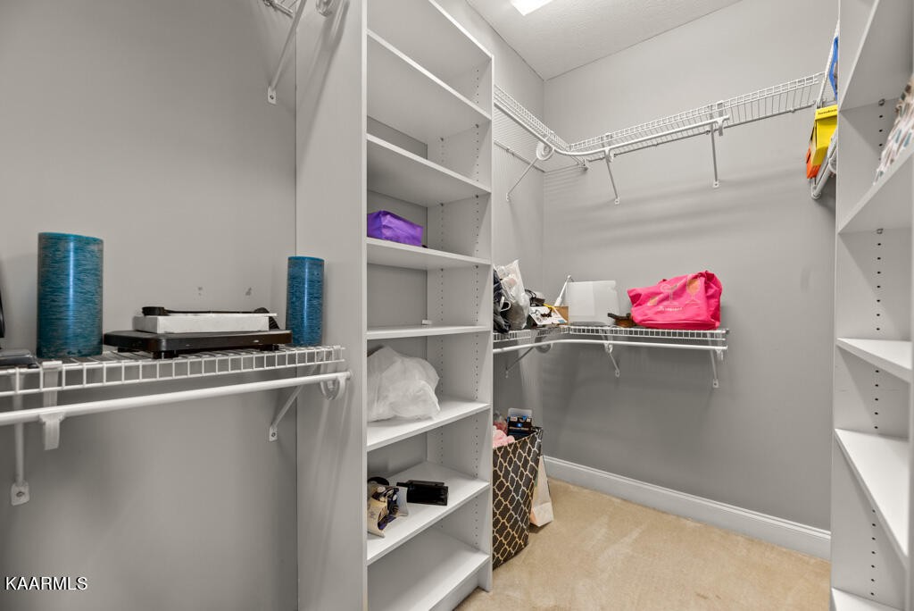 2582 Meadow Road West Greenback, TN 37742 - Photo 23 of 60 a utility room with cabinets and washer