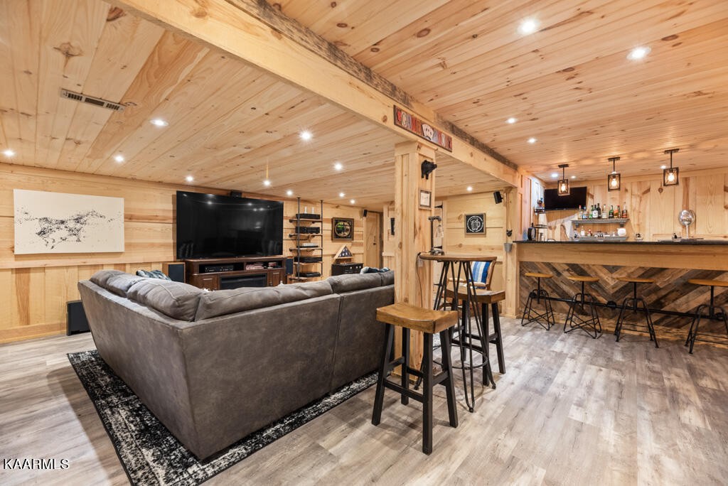 2582 Meadow Road West Greenback, TN 37742 - Photo 37 of 60 a living room with furniture and a flat screen tv