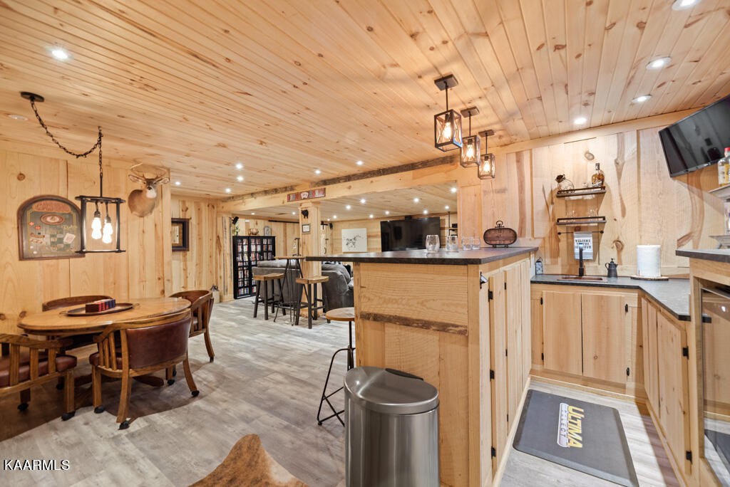 2582 Meadow Road West Greenback, TN 37742 - Photo 40 of 60 a view of a dining area with furniture and a chandelier
