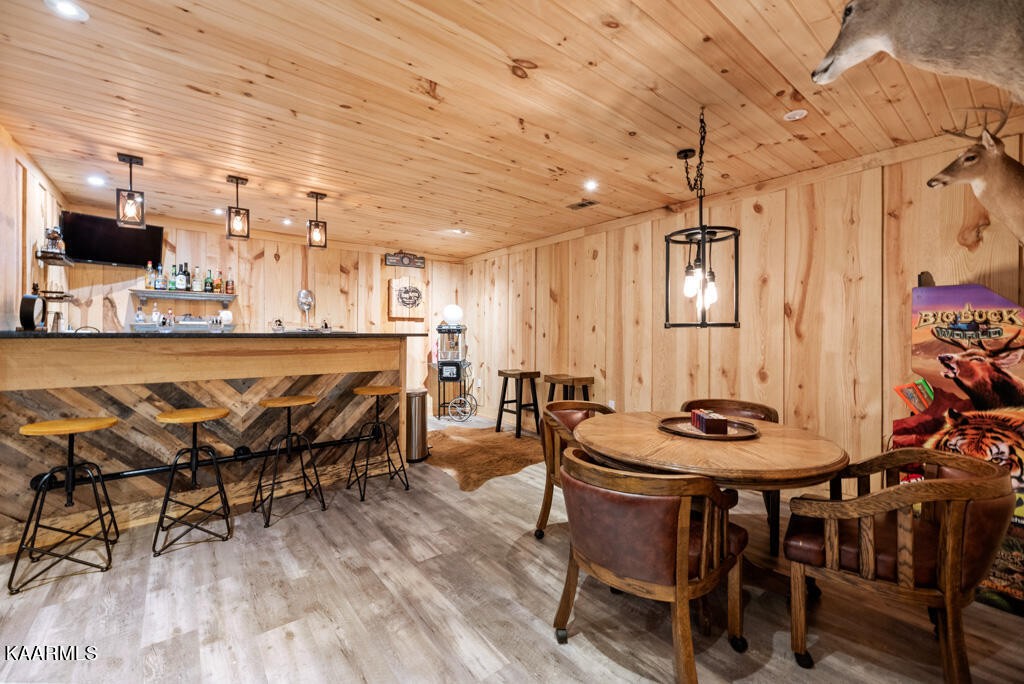 2582 Meadow Road West Greenback, TN 37742 - Photo 41 of 60 a dining room with furniture and wooden floor
