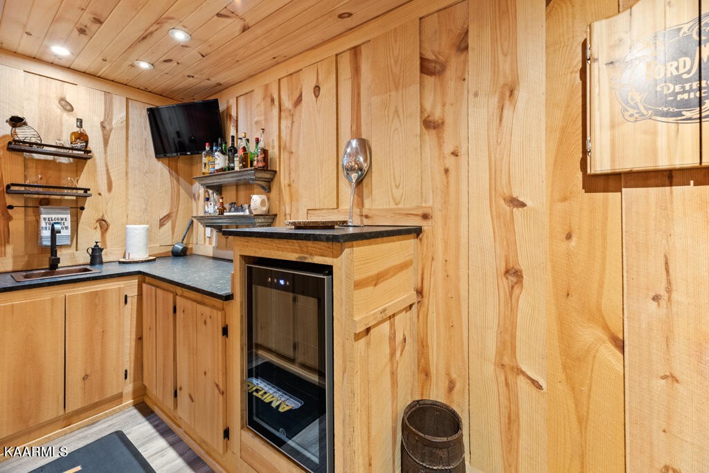 2582 Meadow Road West Greenback, TN 37742 - Photo 43 of 60 a kitchen with stainless steel appliances granite countertop a stove a sink and a refrigerator with wooden floor