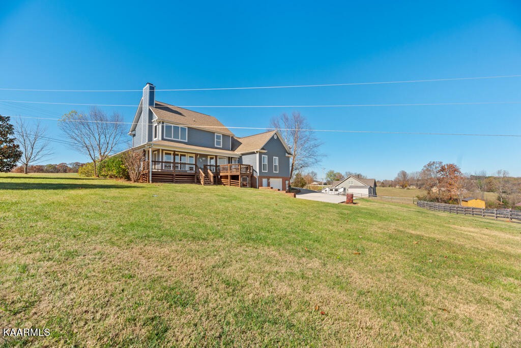 2582 Meadow Road West Greenback, TN 37742 - Photo 52 of 60 a view of a big room with a big yard and large trees
